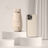 Mini Folding Travel Umbrella with UPF50+ Sun Protection for Outdoor Use Beige