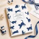 2027 to 2030 A5 Spiral Four Year Planner Notebook Monthly Goals Style 2