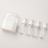 4-in-1 Travel Toiletry Cosmetic Bottle Set 4 Pieces 40ml Leak-Resistant Travel Dispenser Bottles for Carry-On Luggage White