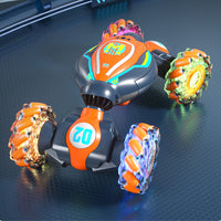 Gesture Sensing RC 4WD Twist Stunt Car Toy 2.4G Remote Control Rotating Car Toy with Lights Music Orange