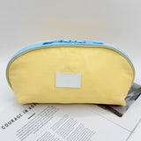 3-in-1 Clam Shaped Travel Bag for Bra Panty and Sock Storage Yellow